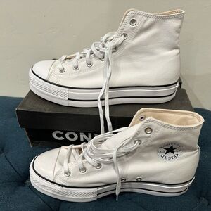 Women’s, white platform Converse sneakers